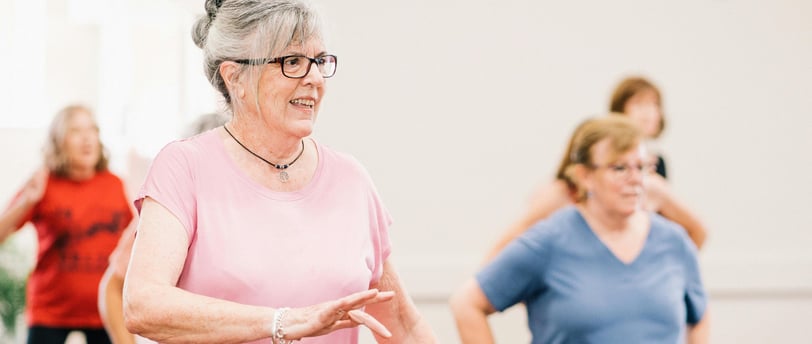 elderly female adults in exercise class