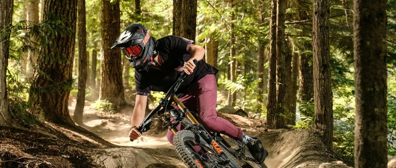 a man riding a bike on a trail