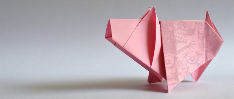 image of origami pink pig with abstract scribbles of the three pigs story