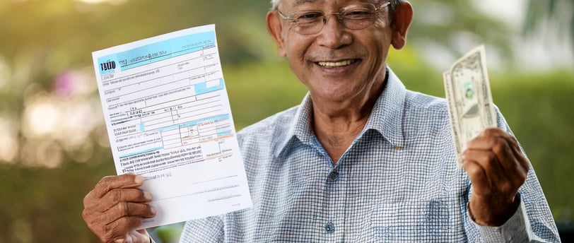 senior citizen receiving big tax refund