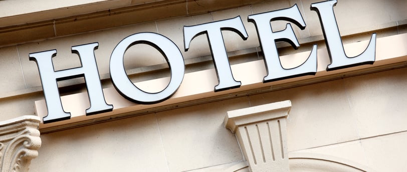 a hotel sign on the side of a building
