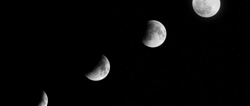a black and white photo of a moon phases of phases of phases of phases of