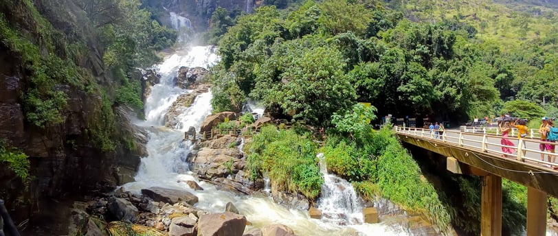Rawana Waterfall near Ella, Sri Lanka, cascading down rocky cliffs surrounded by lush greenery