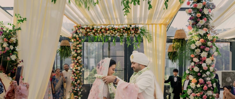 a bride and groom are getting married in a wedding ceremony