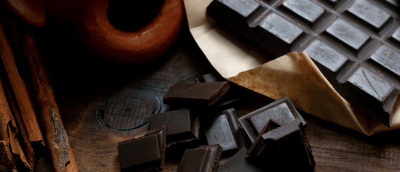 a chocolate bar with chocolate bars and cinnamons