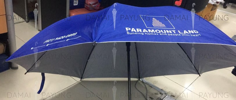 Payung promosi polos lipat premium Rosida biru silver Paramount Land