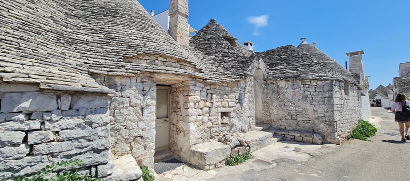 Traditional Trulli houses with conical roofs in Alberobello, Puglia