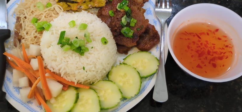 a plate of food with rice and vegetables
