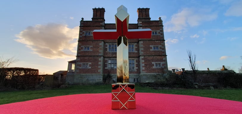 One half of the artwork 'In Hoc Signo' shown in front of Soulton Hall.