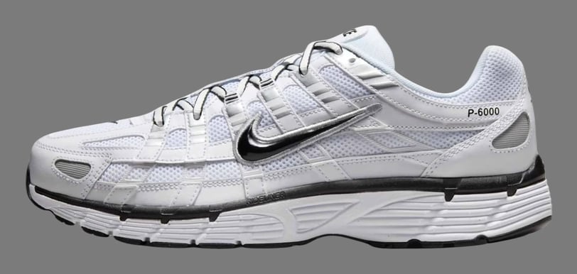 a pair of white sneakers Nike P-6000