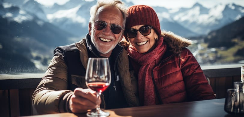 a married couple enjoying their food & wine tour in the alps