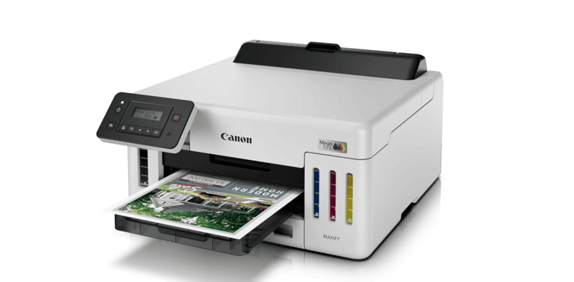 Canon MegaTank GX5120 printer printing a high-quality color document, featuring visible ink tanks an