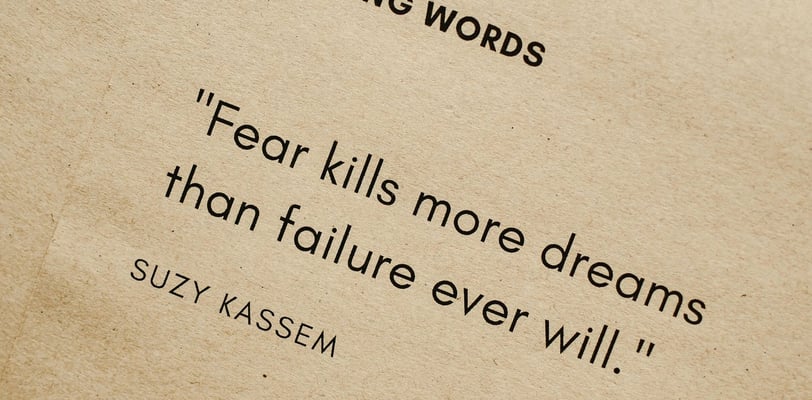 a stack of paper with a quote on it about self development