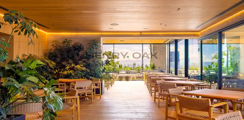 a restaurant with a wooden table and chairs