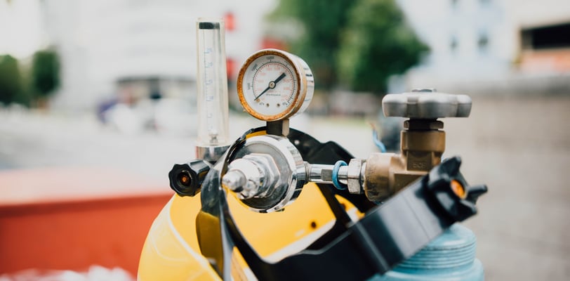 an oxygen cylinder with regulator