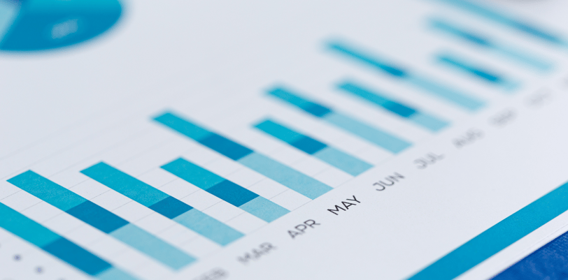 a close up of the monthly financial data of a business in bar graphs and pie charts