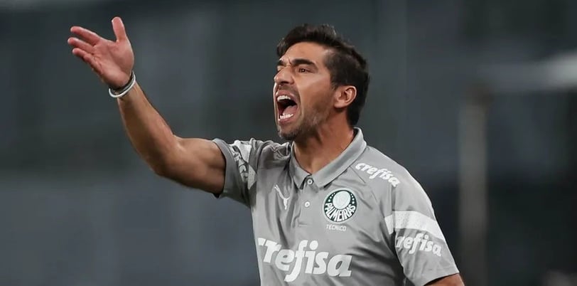 a soccer player is shouting at the camera