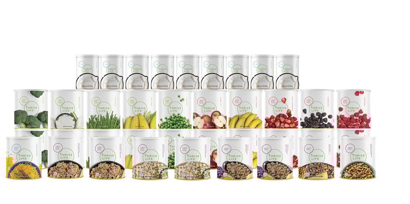 Cans of Thrive Freeze Dried Food showcasing proteins, fruits, vegetables and milk.