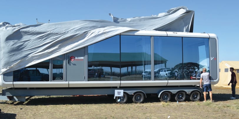 a large trailer with a large trailer attached to it