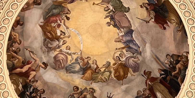a dome of a building with a painting of a painting on it
