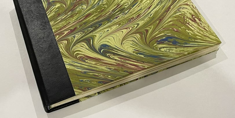 Album with marbled paper and decorative pages