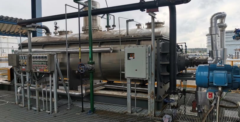 A JexDry paddle dryer in an industrial setting, highlighting its energy-efficient design