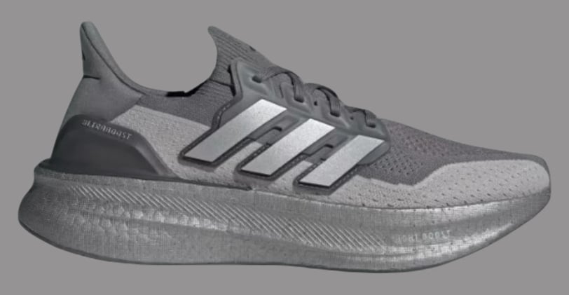 a close up of a grey and white adidas  running sneaker ultraboost 5