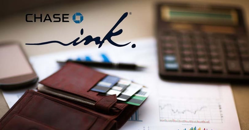 Chase Ink over a wallet and a cell phone