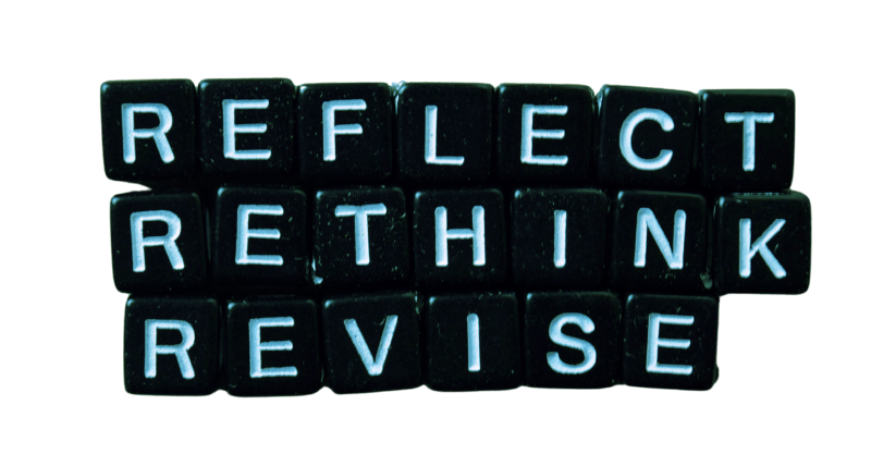 a black and white photo of a set of four black and white letters says reflect rethink revise