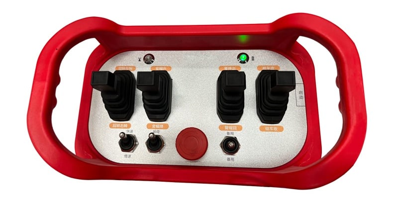 Loader crane Wireless Remote Control in red and black color scheme, equipped with four buttons.