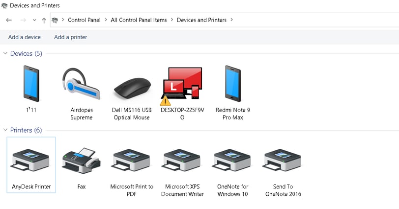 User accessing printer settings on a computer to change default printer settings.