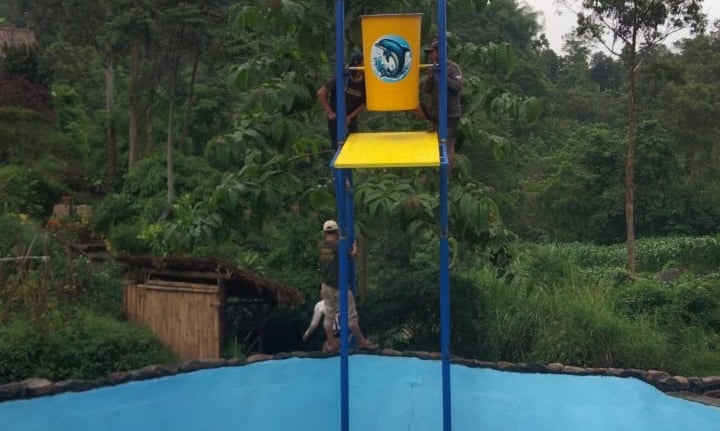 renovasi kolam renang alam dan penambahan wahana bermain