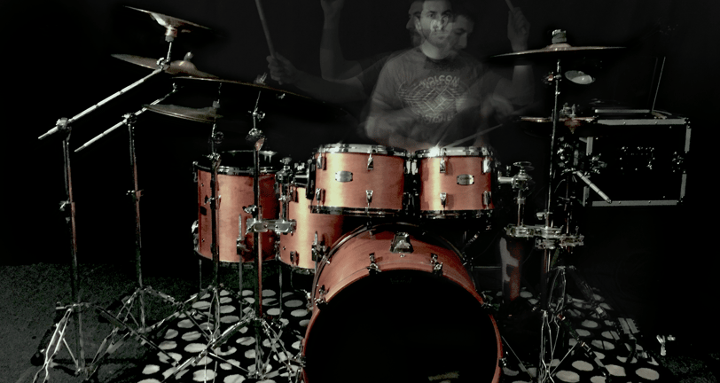 artistic picture of a man playing drums