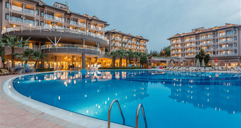High quality Image showcasing a 5 Star Hotel with a big pool provided by Shark Hotels to our clients