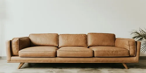 Browm Sectional leather sofa by afsar sofa repair