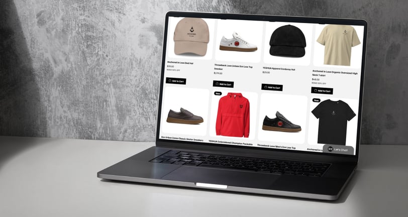 a laptop computer screen displaying YESHUA Apparel products