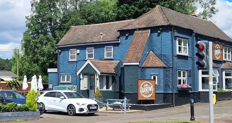 a country pub with a traffic light