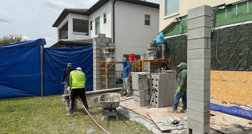 FC Innovations team rebuilding porch framework from the ground up — expert residential remodeling in