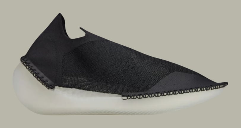 a pair of black shoes with off-write sole, adidas Y-3 Itogo