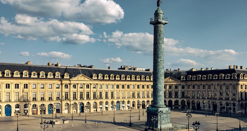 a tall tower with a clock on top of it