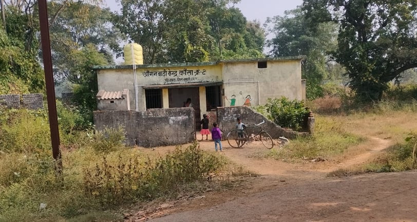 boys stand with cycle front of anganwadi kendar