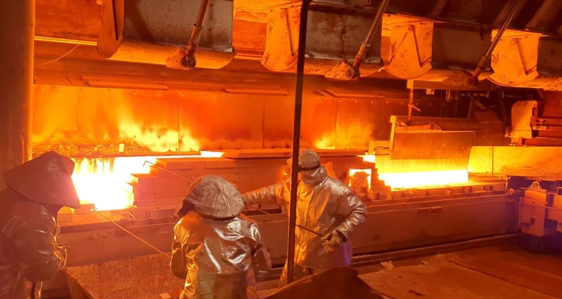 a group of people working in a factory