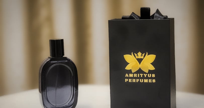 a black perfume bottle with a black box and a black box with a crown on