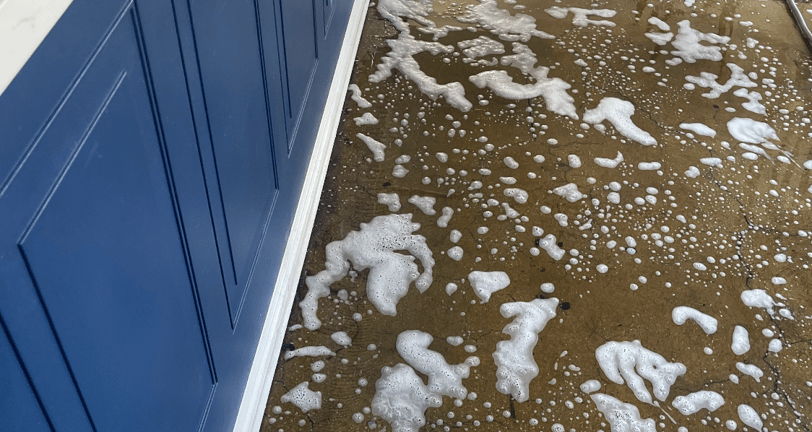 a floor with a lot of soap foam on it