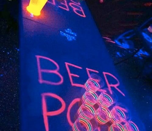 Beer Pong during the Riga Pub Crawl tour