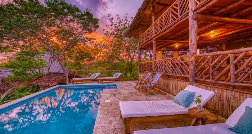 pool with magical sunset and community space retreatcenter Eden on the Chocolata