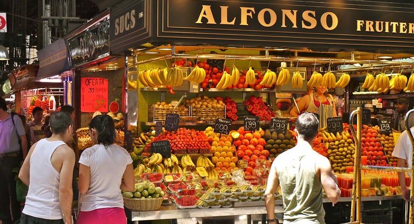 Vibrant food market in Barcelona showcasing fresh produce and local delicacies