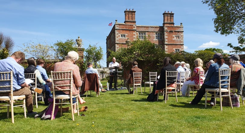 Harry Frost performing Erkenwald in front of Soulton Hall