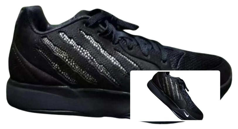 a pair of black and white sneakers with a black and white shoelacee