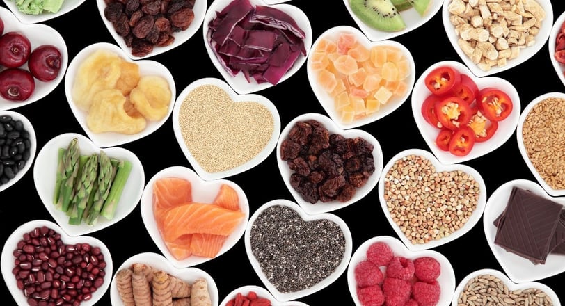 a variety of fruits and vegetables in bowls
